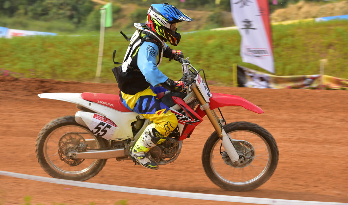 A rider enjoy riding gasoline powered dirt bike